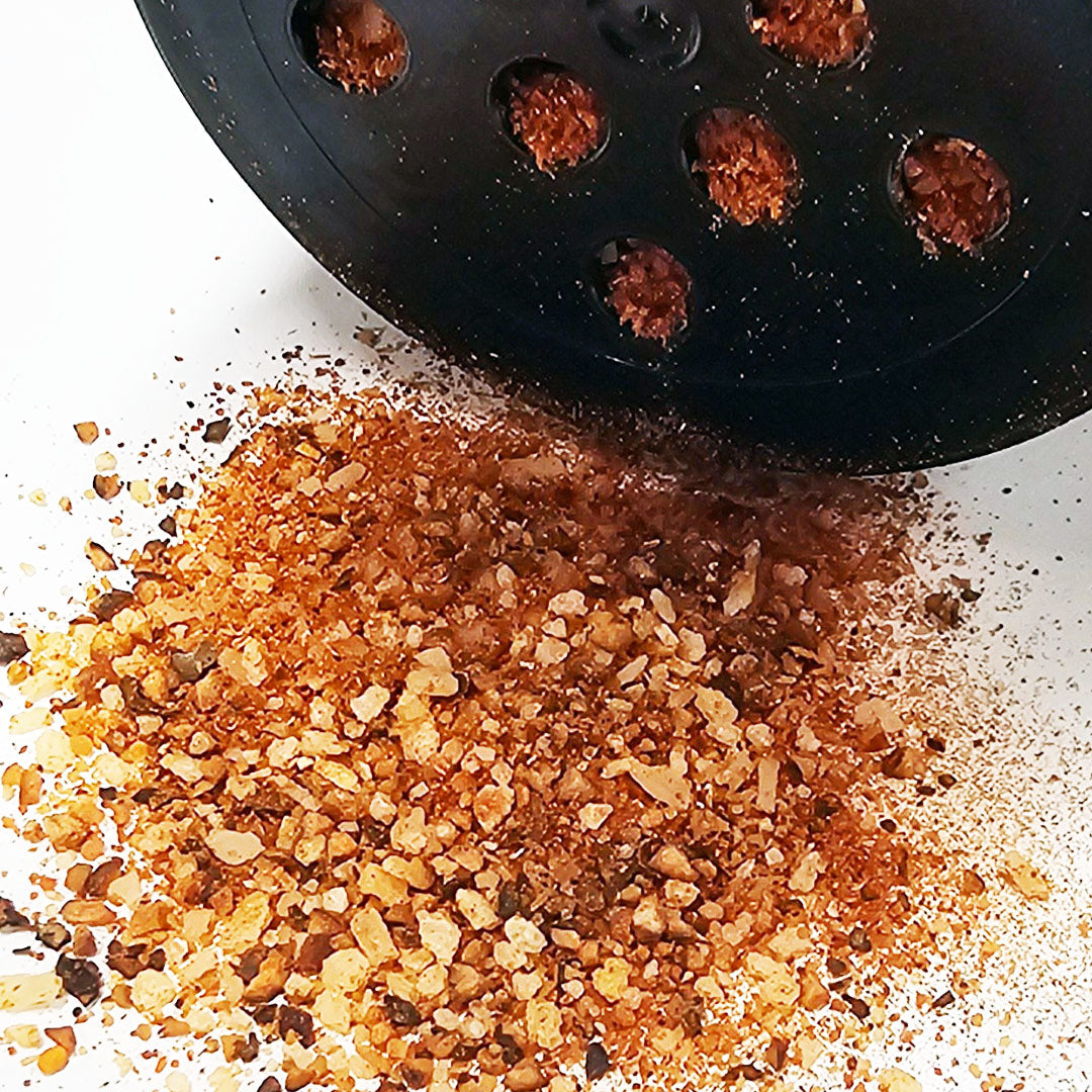Close-up of spilled Black Canyon Gold Spice - Rich and aromatic blend, macro view