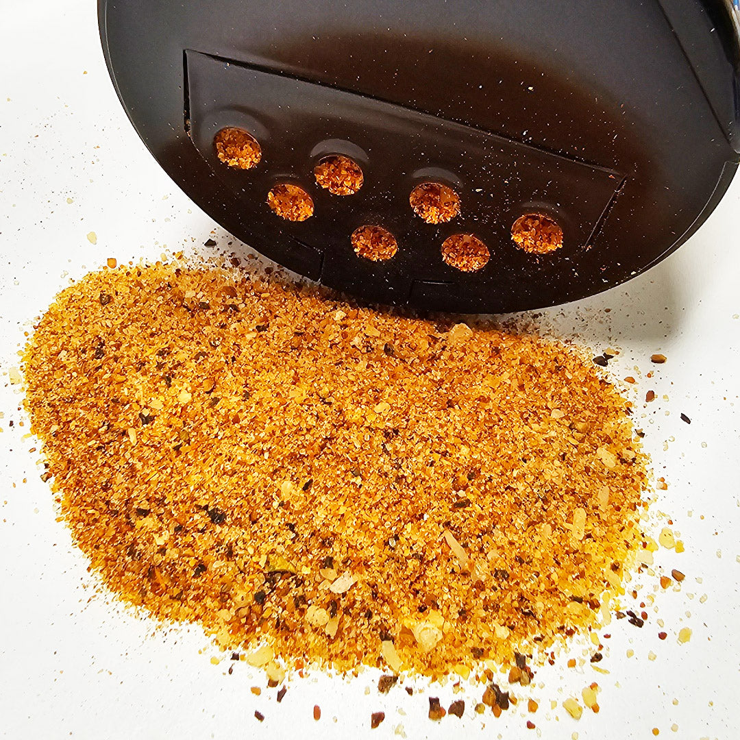 Close-up of spilled Phoenix Competition Pork Rub - Bold and flavorful, macro view