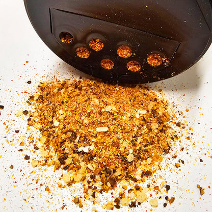Close-up of spilled Phoenix Competition Beef Rub - Bold and flavorful, macro view