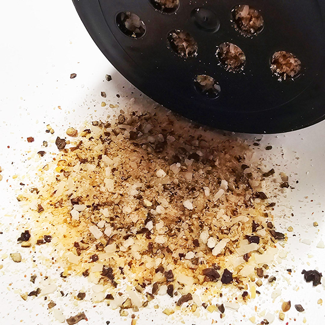 Close-up of spilled Signature Steak Seasoning - Bold and flavorful, macro view